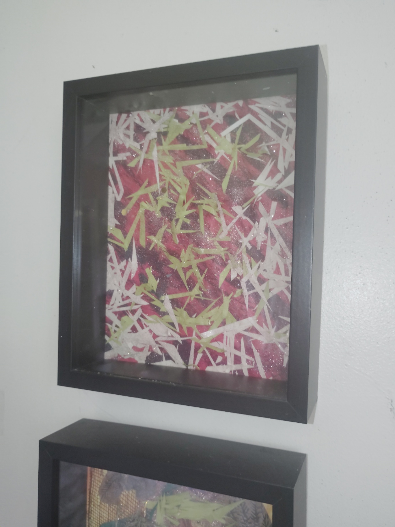 Framed Cat Nap Inn artwork with pink and berry tones layered under pale green and white cut-paper marks